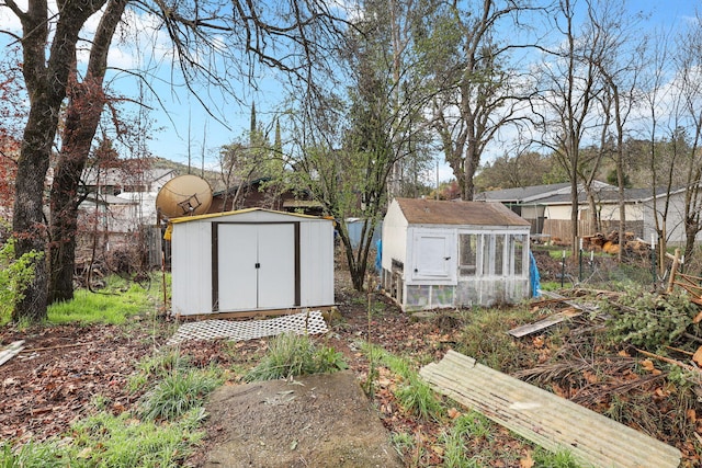 14839 Lamoine Dr, Redding, CA 96003 - view of shed with exterior structure and fence