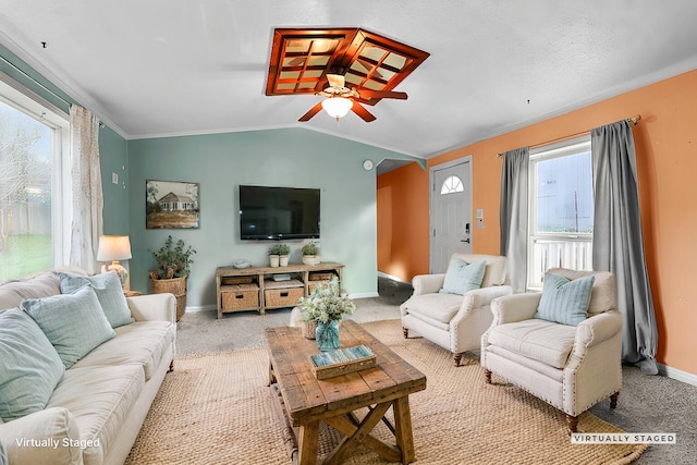 14839 Lamoine Dr, Redding, CA 96003 - living room with a wealth of natural light, lofted ceiling, ceiling fan, and carpet flooring