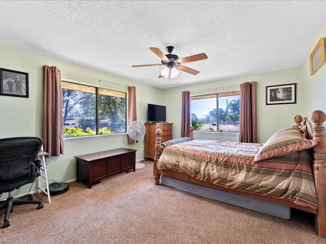 19907 Hidden Hills Rd, Cottonwood, CA 96022 - bedroom with carpet, a textured ceiling, and a ceiling fan