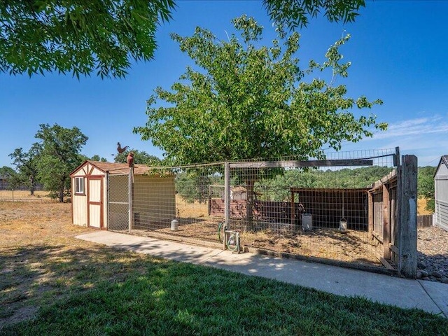 19907 Hidden Hills Rd, Cottonwood, CA 96022 - view of yard featuring an outbuilding and a shed