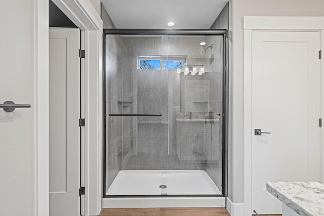 full bath featuring a stall shower