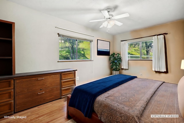 bedroom with light wood-type flooring