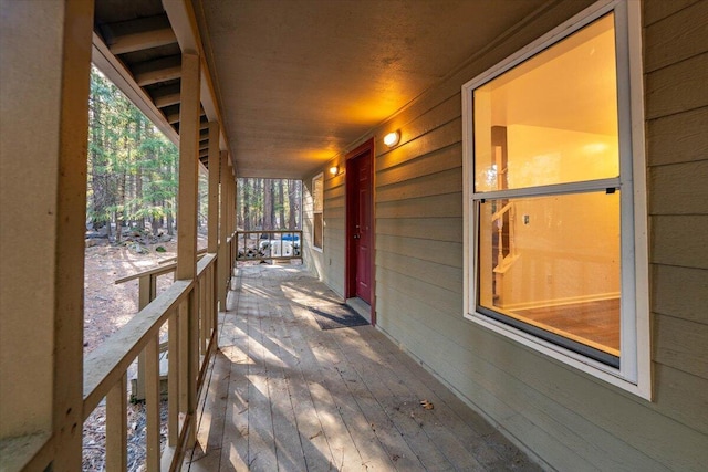 view of patio featuring a porch