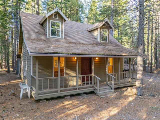 view of front of property featuring covered porch