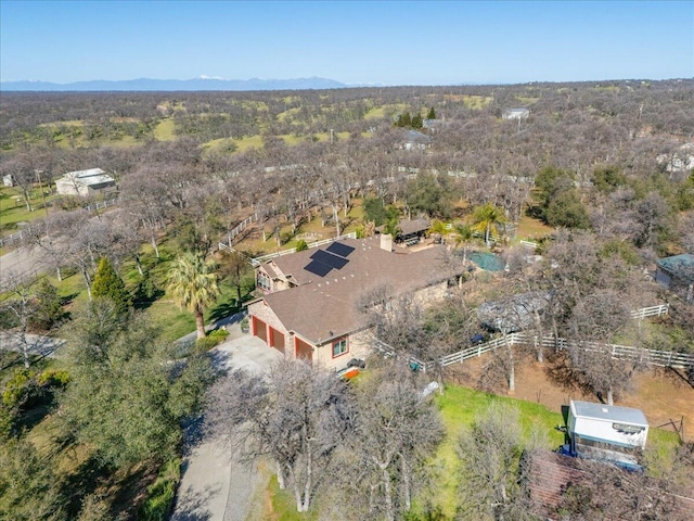 aerial view with a forest view and a mountain view