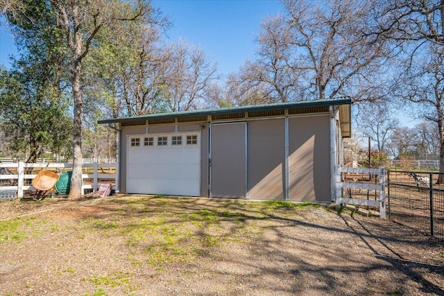 garage featuring fence