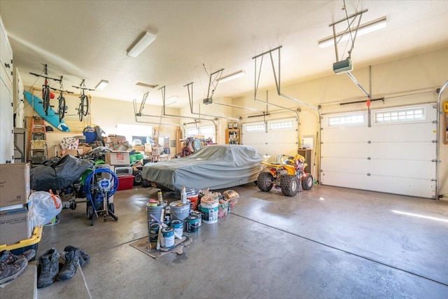 garage featuring a garage door opener