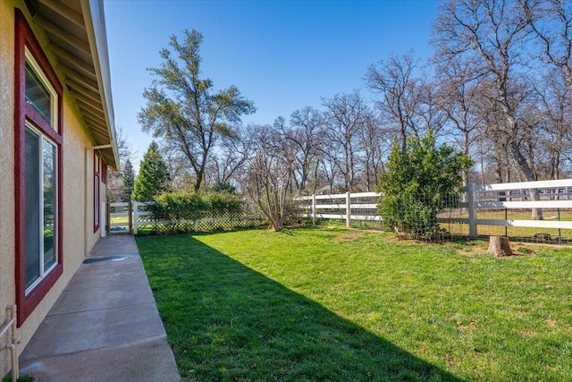 view of yard featuring fence