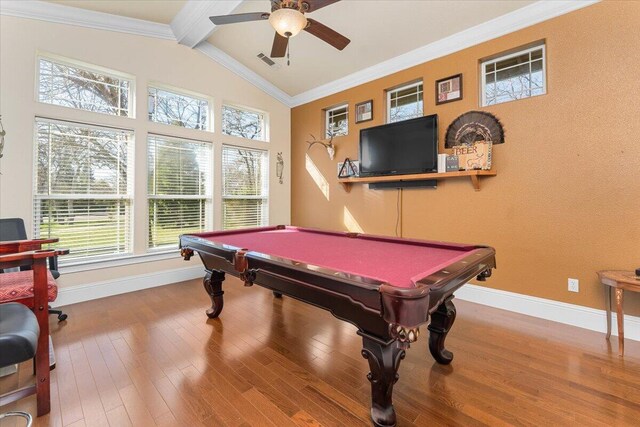 playroom featuring vaulted ceiling with beams, crown molding, baseboards, and hardwood / wood-style flooring