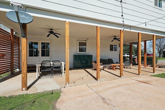 view of patio / terrace with a ceiling fan and outdoor dining space