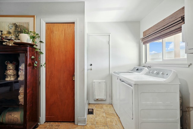 laundry room with laundry area and washing machine and dryer