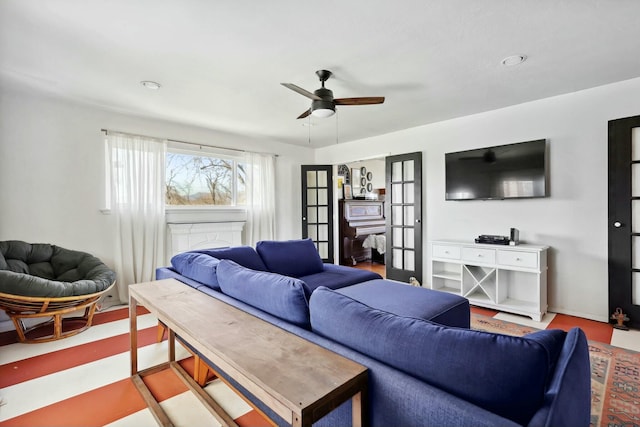 living area featuring ceiling fan