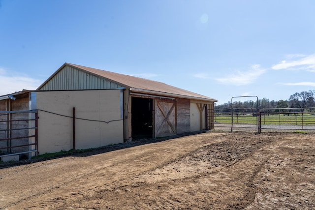 view of outdoor structure with an outdoor structure and fence