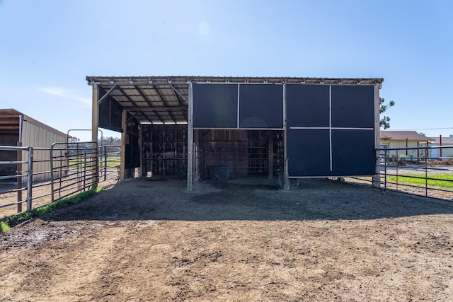 view of outdoor structure featuring an exterior structure and an outbuilding