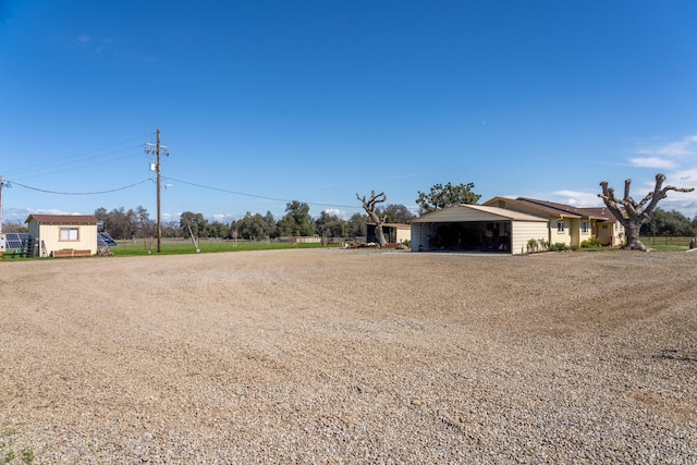 view of yard with a carport