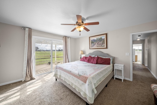 bedroom with access to exterior, baseboards, and carpet floors