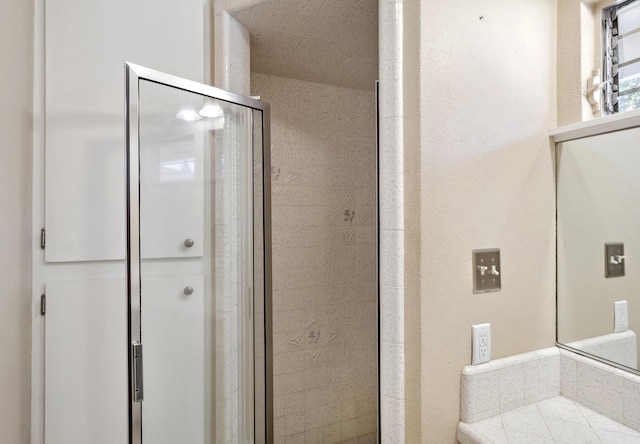 bathroom with a stall shower