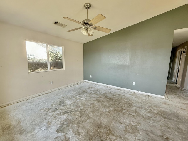 unfurnished room featuring lofted ceiling, ceiling fan, and visible vents