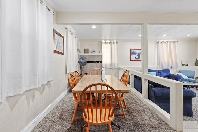 dining area with recessed lighting and baseboards