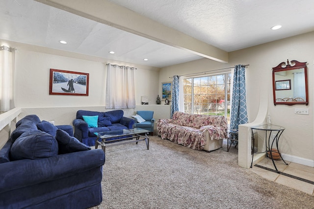 carpeted living room with beam ceiling, recessed lighting, and a textured ceiling