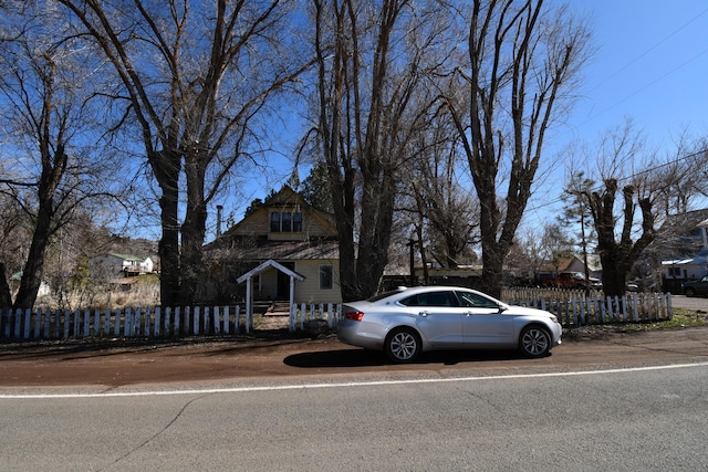 view of front of property with fence