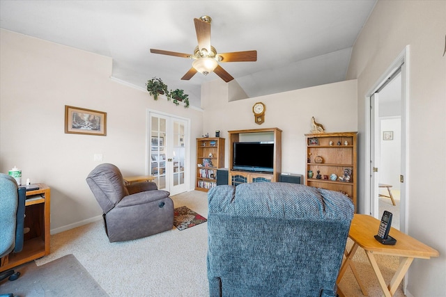 carpeted living room featuring lofted ceiling, ceiling fan, french doors, and baseboards