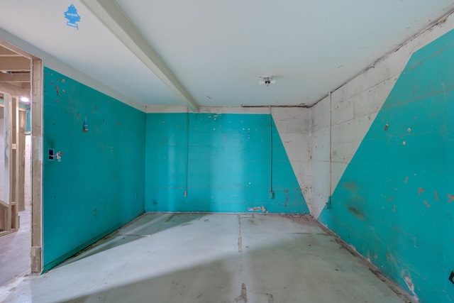 interior space with unfinished concrete flooring