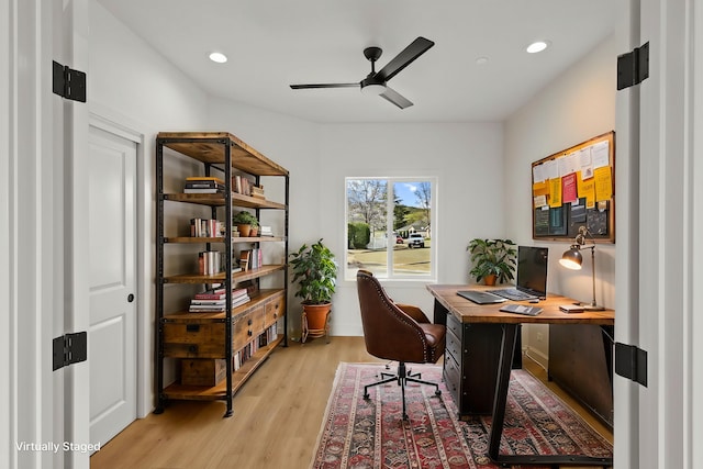 office with light wood-type flooring, a ceiling fan, and recessed lighting