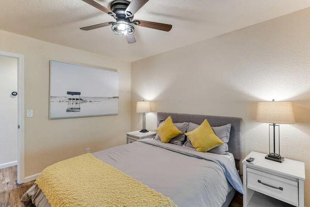 18260 Racoon Dr, Lakehead, CA 96051 - bedroom with ceiling fan, baseboards, and wood finished floors