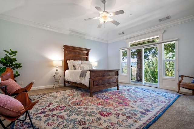 carpeted bedroom featuring access to exterior, visible vents, and ornamental molding