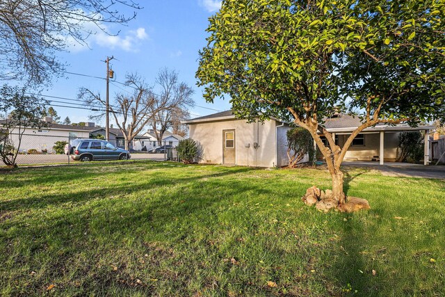 view of yard featuring fence