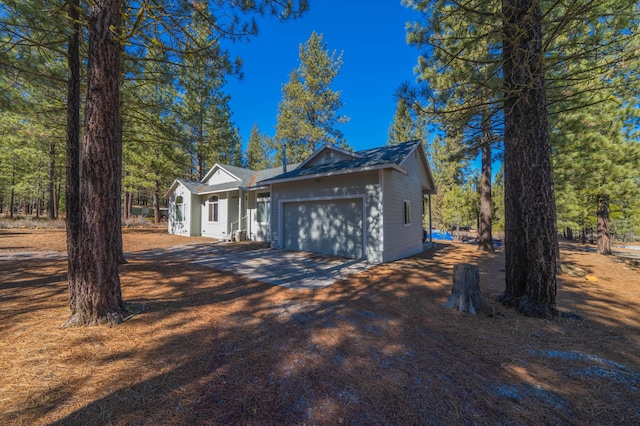 view of front of house with driveway and an attached garage