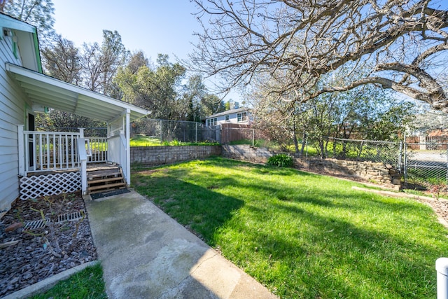 view of yard with a fenced backyard