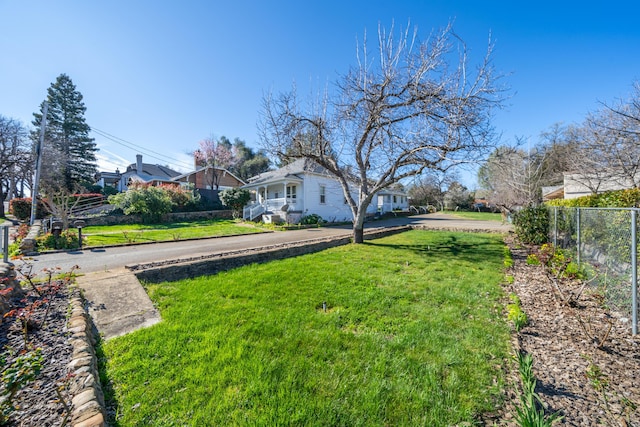 view of yard featuring fence