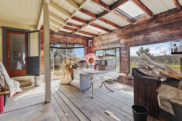 sunroom / solarium featuring a skylight