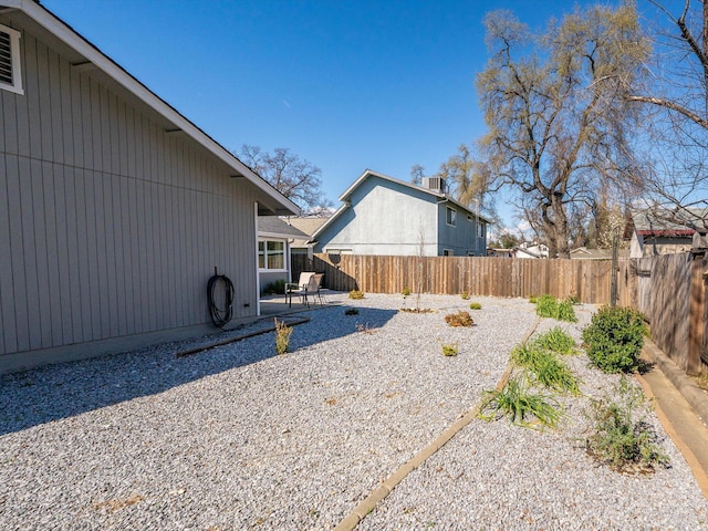 view of yard featuring a fenced backyard and a patio area