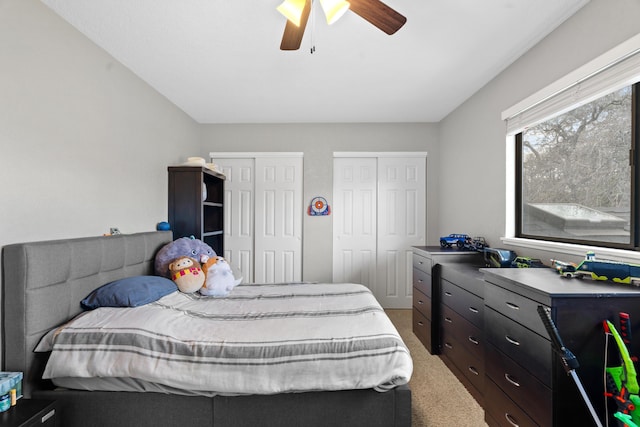 3300 Forest Hills Dr, Redding, CA 96002 - carpeted bedroom featuring multiple closets and a ceiling fan