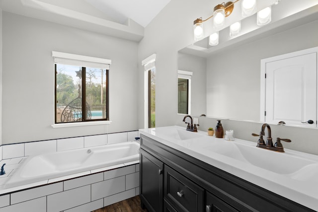 3300 Forest Hills Dr, Redding, CA 96002 - full bath featuring lofted ceiling, double vanity, a sink, and a bath