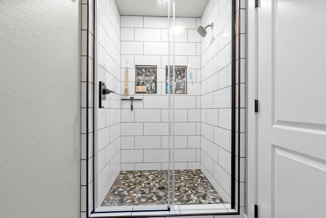 3300 Forest Hills Dr, Redding, CA 96002 - bathroom with a textured wall and a shower stall