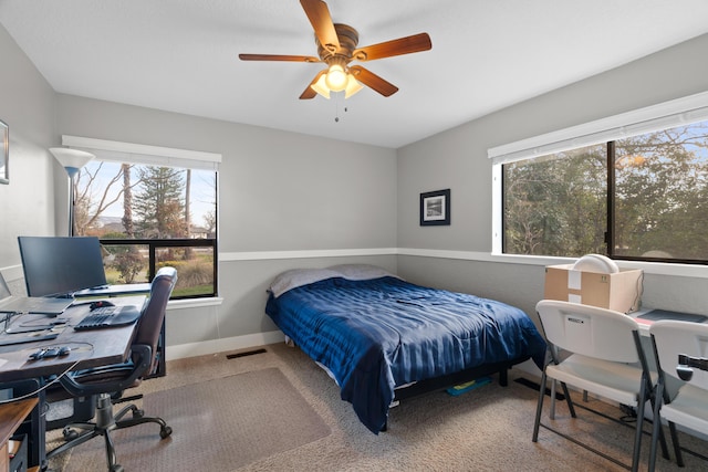 3300 Forest Hills Dr, Redding, CA 96002 - carpeted bedroom featuring visible vents, ceiling fan, and baseboards