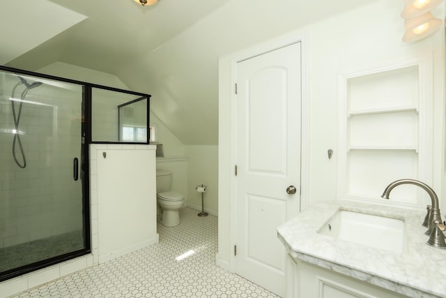 full bath with lofted ceiling, toilet, a shower stall, vanity, and baseboards