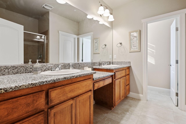 full bathroom with visible vents, a sink, a shower stall, and double vanity