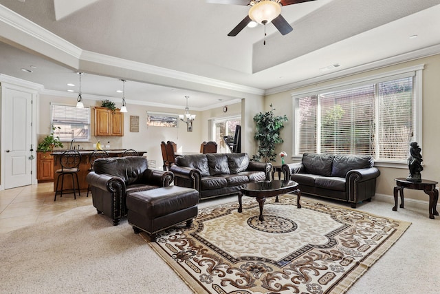 living room with ornamental molding, a wealth of natural light, light tile patterned flooring, and visible vents