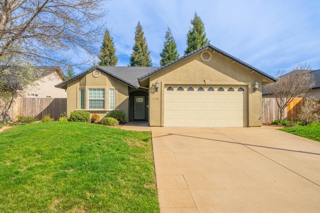 ranch-style house with a garage, fence, concrete driveway, stucco siding, and a front yard