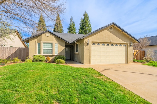 ranch-style home featuring driveway, a garage, stucco siding, fence, and a front yard