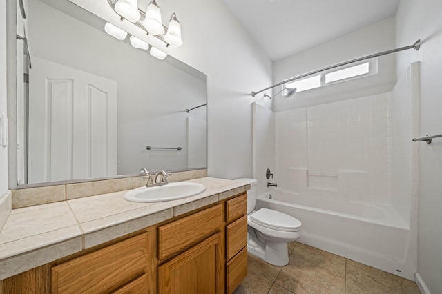 bathroom with vanity, tile patterned flooring, shower / tub combination, and toilet