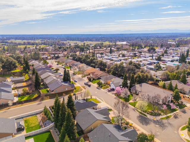 birds eye view of property with a residential view