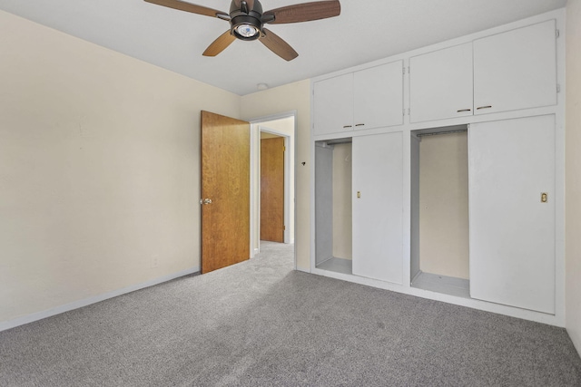 unfurnished bedroom with carpet floors and ceiling fan