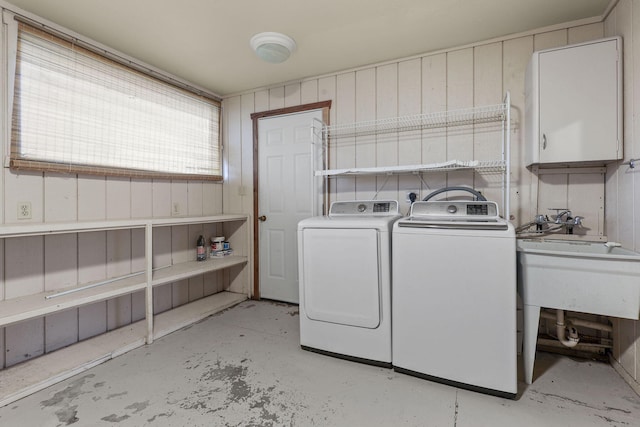 laundry room featuring laundry area and washer and clothes dryer