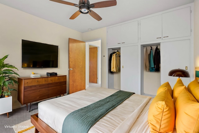 bedroom featuring light carpet and ceiling fan